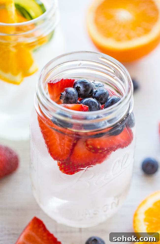 Refreshing Flavored Water Recipes for Every Taste 3 berry flavored water in glass jar