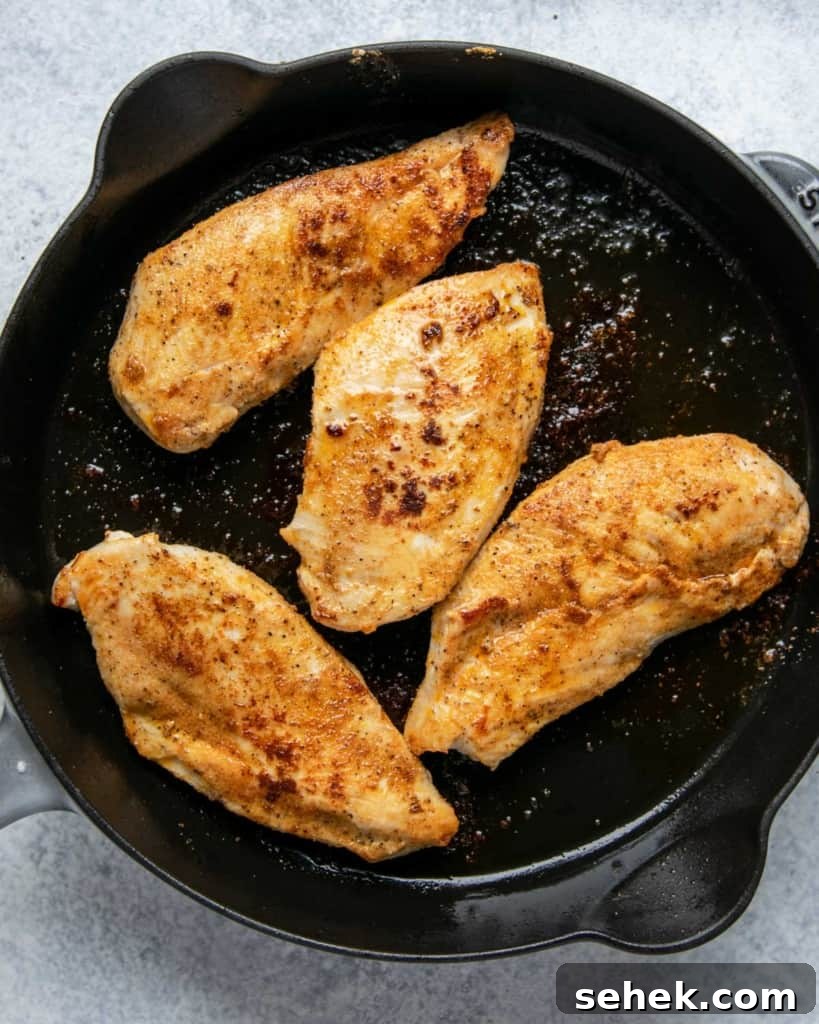 Creamy Dijon Chicken with Mushrooms and Garlic Herbs 6 cooked chicken breast in the skillet