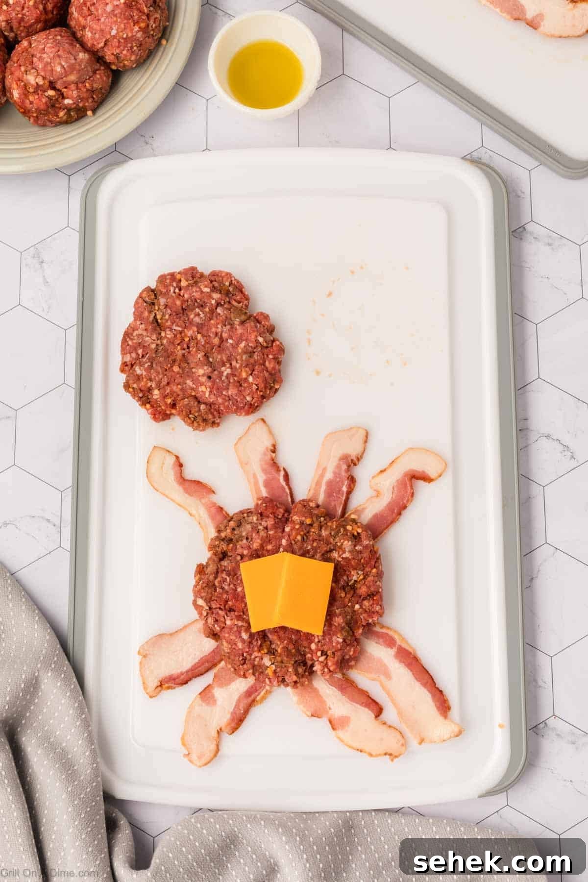 Bacon-Wrapped Burger Recipe: Juicy Grilled Bacon Burger Guide 7 Ground beef pattie on bacon strips topped with cheese slices