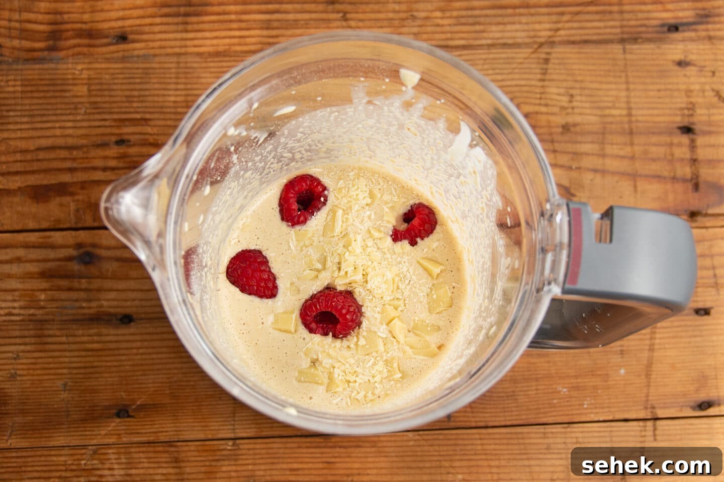 White Chocolate Raspberry Protein Baked Oats 8 This is a picture of the blended oats with white chocolate and raspberries added.
