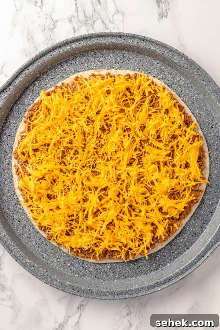 Overhead view of first layer of taco bake