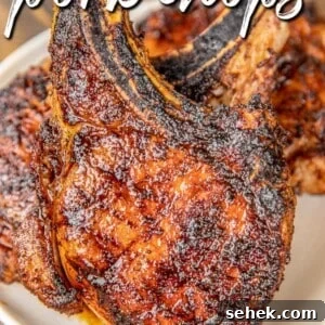 Perfect Pan-Seared Pork Chops with Garlic Herb Butter 5 plate of grilled pork chops