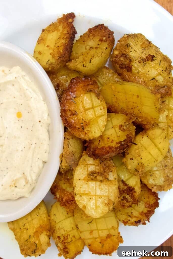 Crispy Parmesan Roasted Potatoes with Garlic and Herbs 7 crispy roasted parmesan potatoes with garlic dipping sauce