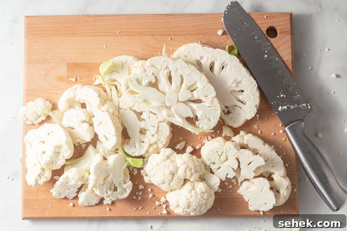 Crispy Air Fryer Cauliflower Steaks with Garlic Herb Sauce 6 cutting cauliflower into steaks.