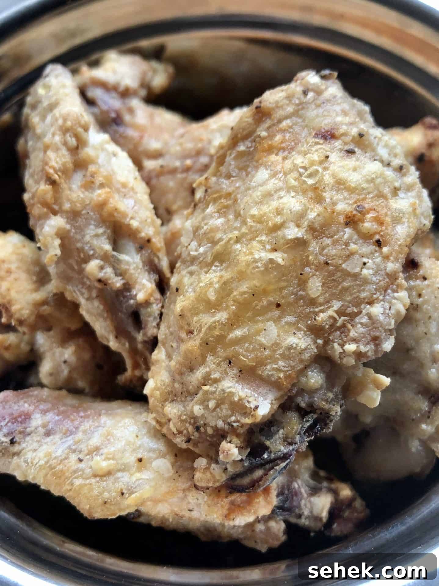 Crispy Air Fryer Wings for Game Day 10 Close up view of air fried chicken wings before sauce