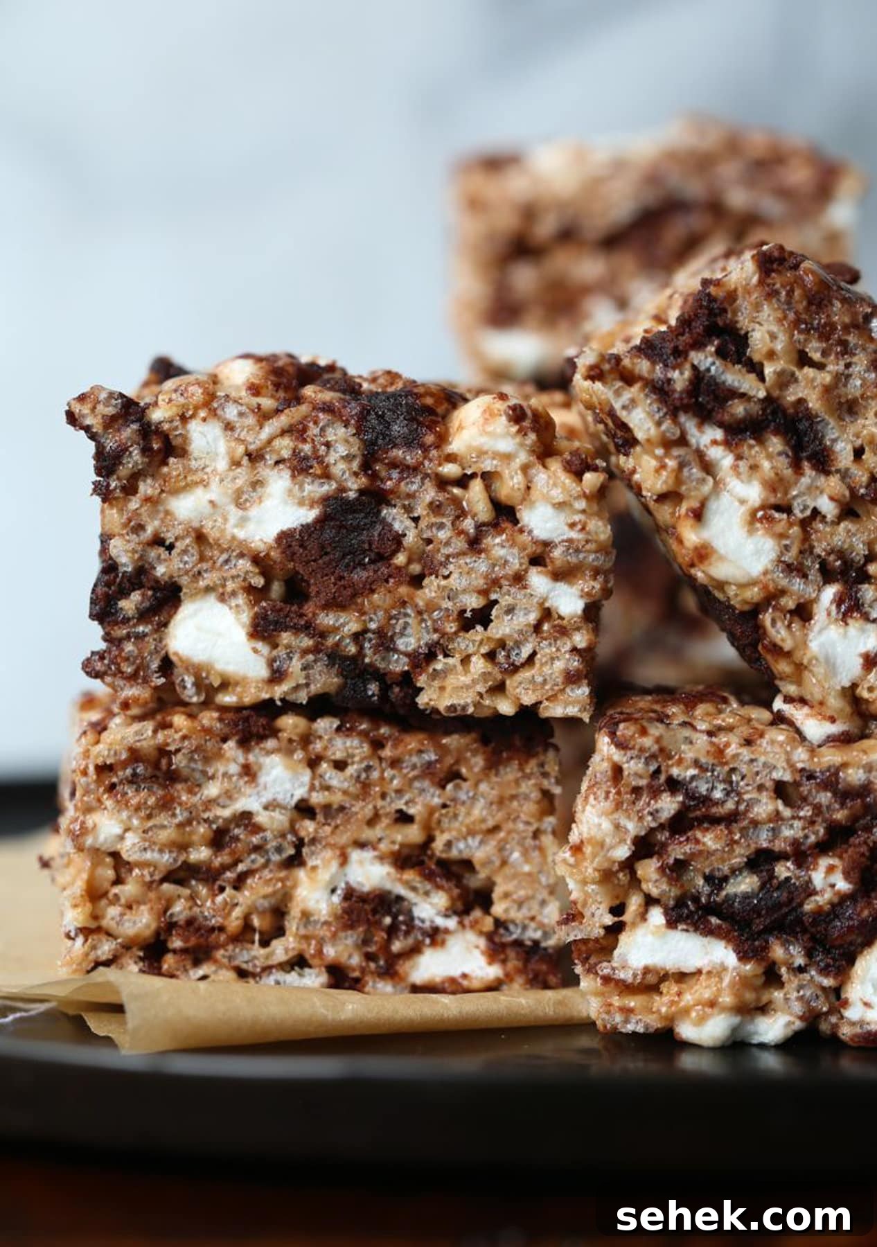 Brownie Batter Krispie Treats Brownie Batter Krispie Treats stacked and loaded with brownies and mashmallows