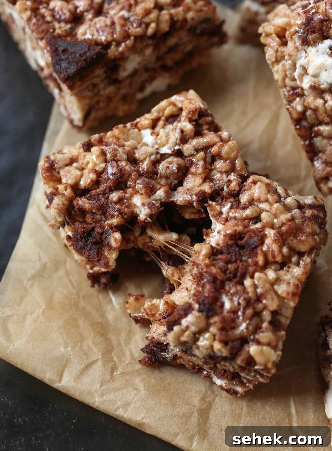 Brownie Batter Krispie Treats Brownie batter Krispie treats breaking in half