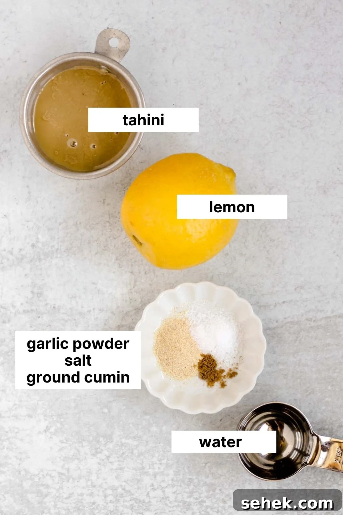 Labeled ingredients needed for tahini dressing.