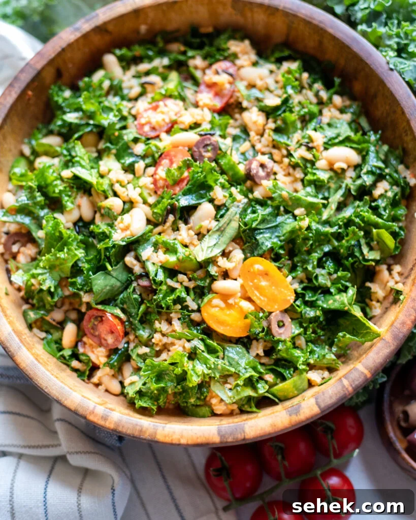 Wild Rice and Kale Salad in a wooden serving dish.