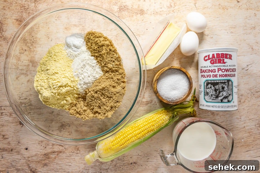 Classic Cornbread Muffins Made with Whole Kernel Corn 4 Bowl with flour, cornmeal, brown sugar and other ingredients
