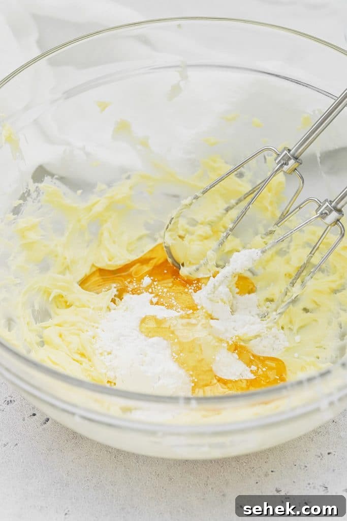 Whipped Honey Butter with Cinnamon — Fluffy Spread Recipe 6 Adding ingredients for cinnamon honey butter