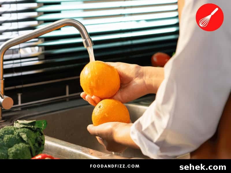 Don't wash oranges until you are ready to consume them. Washing them might promote the development of fruit mold.