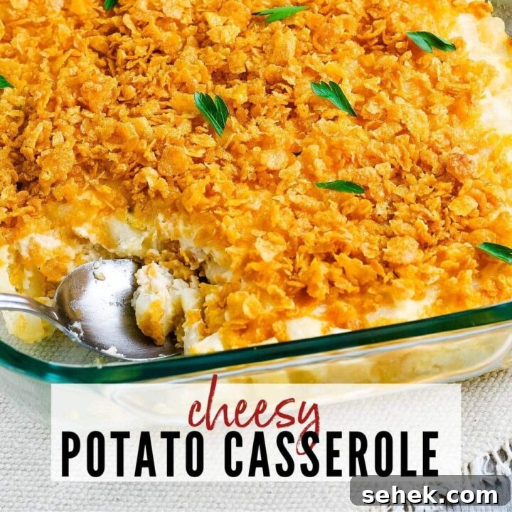 cheesy potatoes with cornflake topping in a glass baking dish with graphic overlay