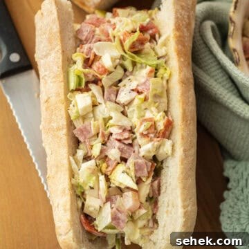 Classic Italian Chopped Sandwich Recipe for a Flavorful Sub 7 Chopped Italian salad in a sandwich.