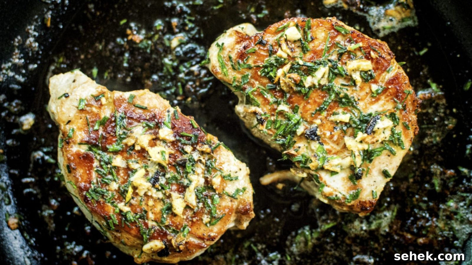 15 Quick Weeknight Dinners to Save You Time and Stress 14 Pork chops pan-seared golden with butter and herbs coating the surface.
