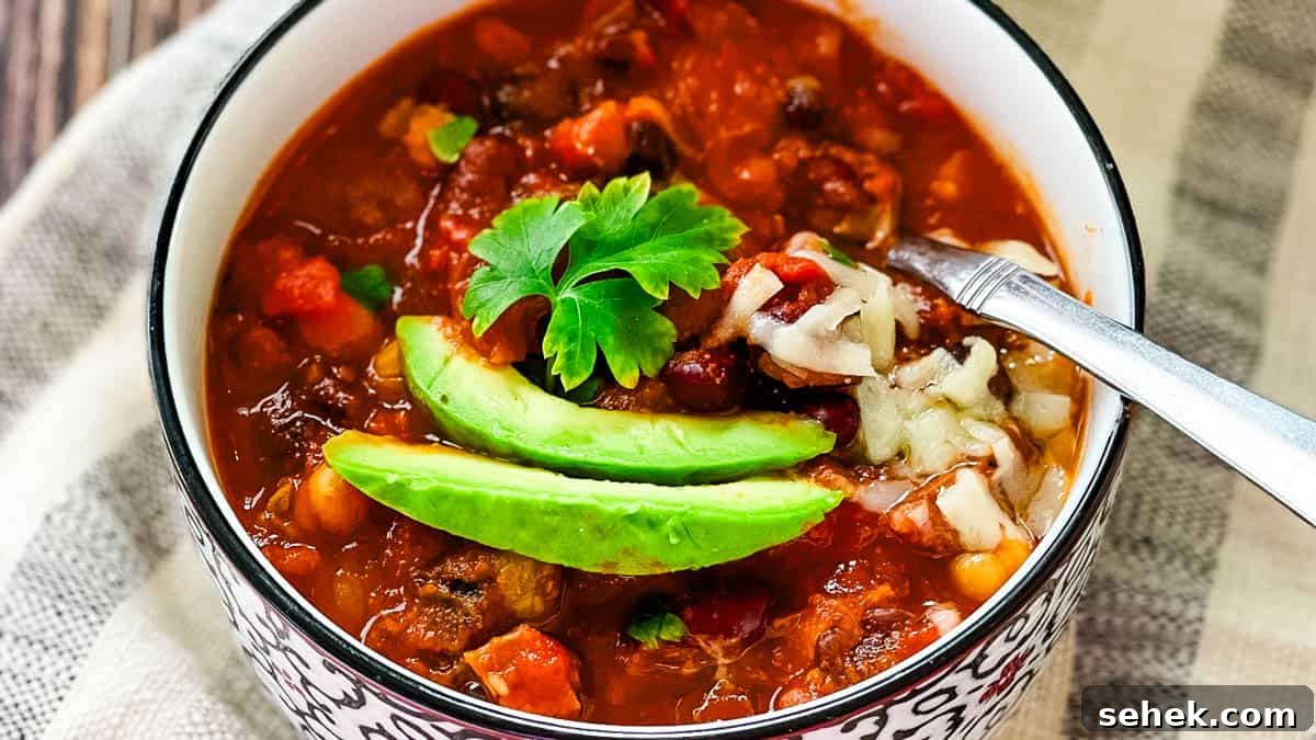 Smoked Brisket and Bean Chili Recipe for Flavorful Comfort 8 Hearty smoked brisket chili recipe made with leftover brisket, beans, tomatoes, and toppings.