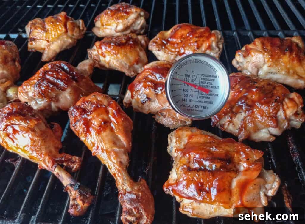 Authentic Amish-Style BBQ Chicken Recipe for Juicy, Smoky Flavor 5 checking chicken for doneness with thermometer