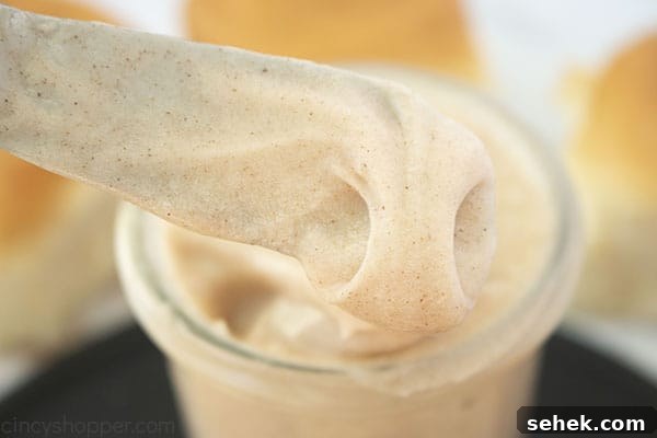 Homemade Cinnamon Butter Recipe for Toasts and Pastries 10 Horizontal of Cinnamon Butter on a knife