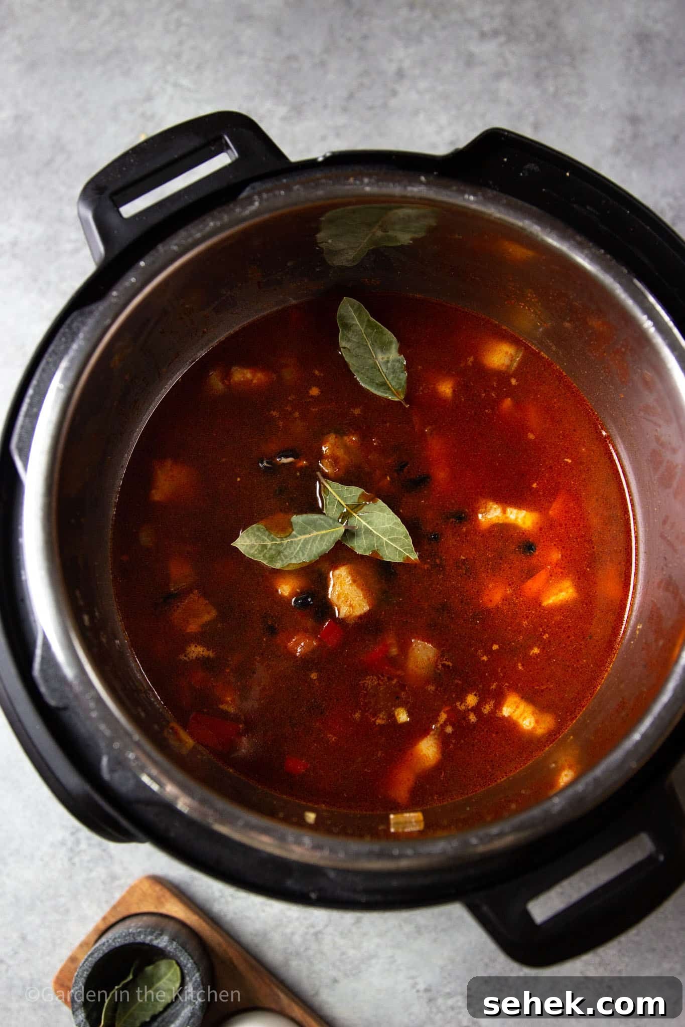 Instant Pot Brazilian Feijoada-Inspired Black Bean Soup 6 uncooked black bean soup in an instant pot.