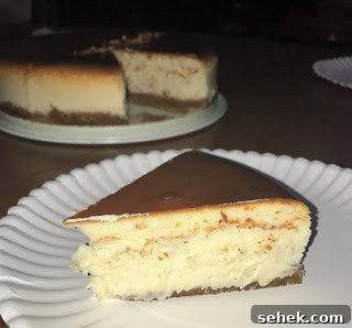 Classic New York Style Cheesecake: Creamy Homemade Recipe 5 Slice of New York-Style Cheesecake