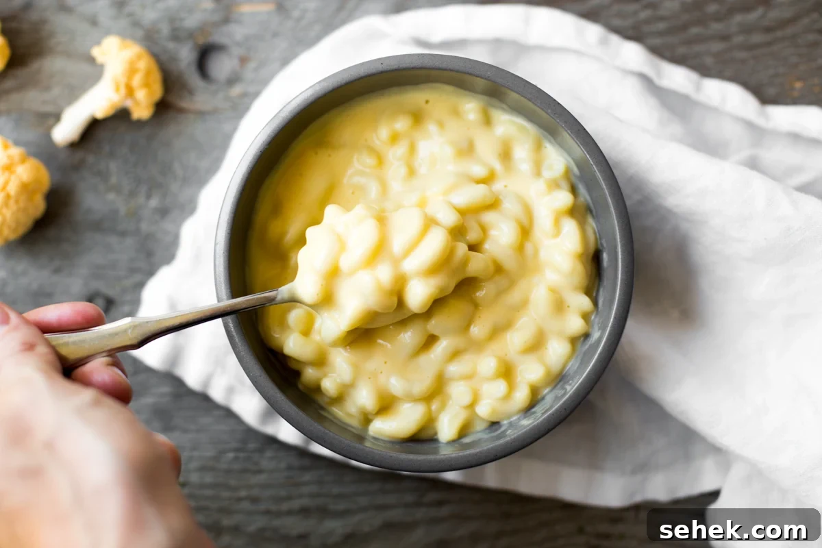 Creamy Stovetop Cauliflower Mac and Cheese Recipe 3 spoonful of cauliflower mac and cheese