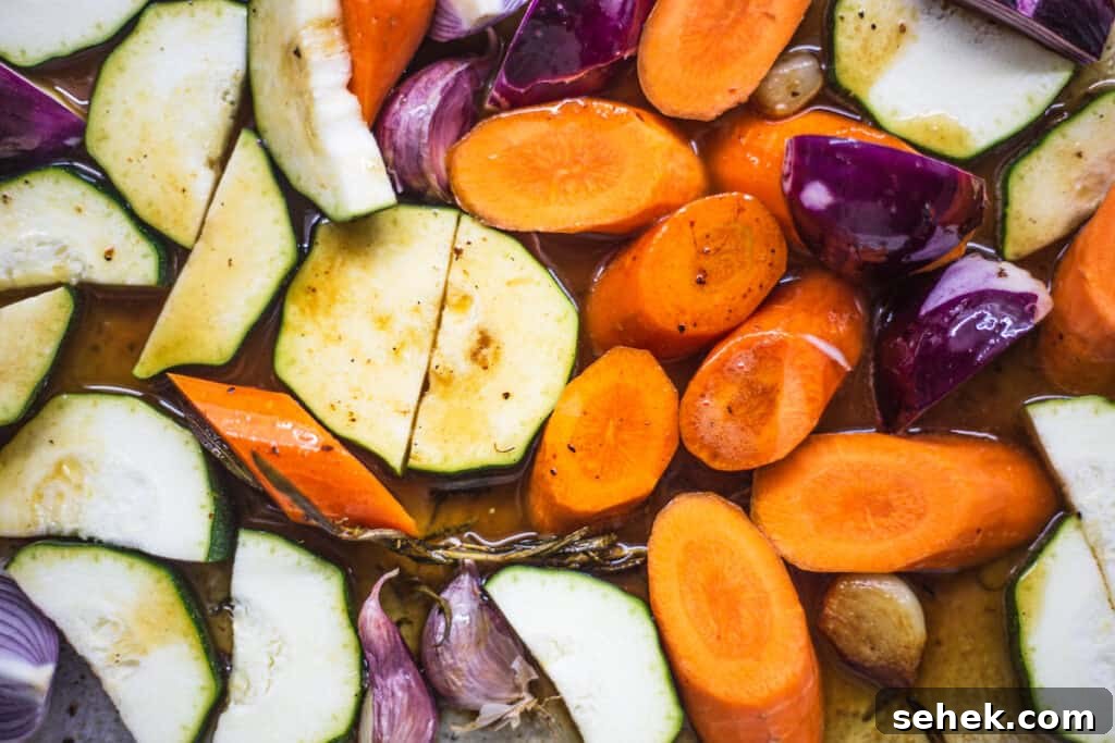 Vegetables in a roasting pan.