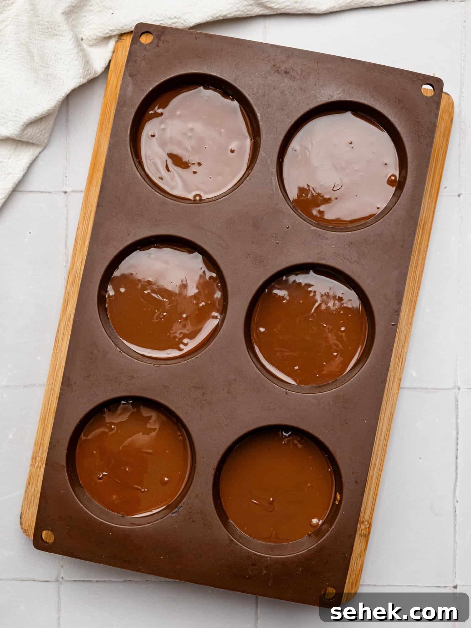 Peanut Butter Weetbix Cups in a silicone muffin tray.