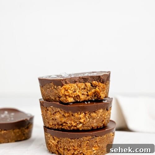 Three Peanut Butter Weetbix Cups stacked on top of each other.