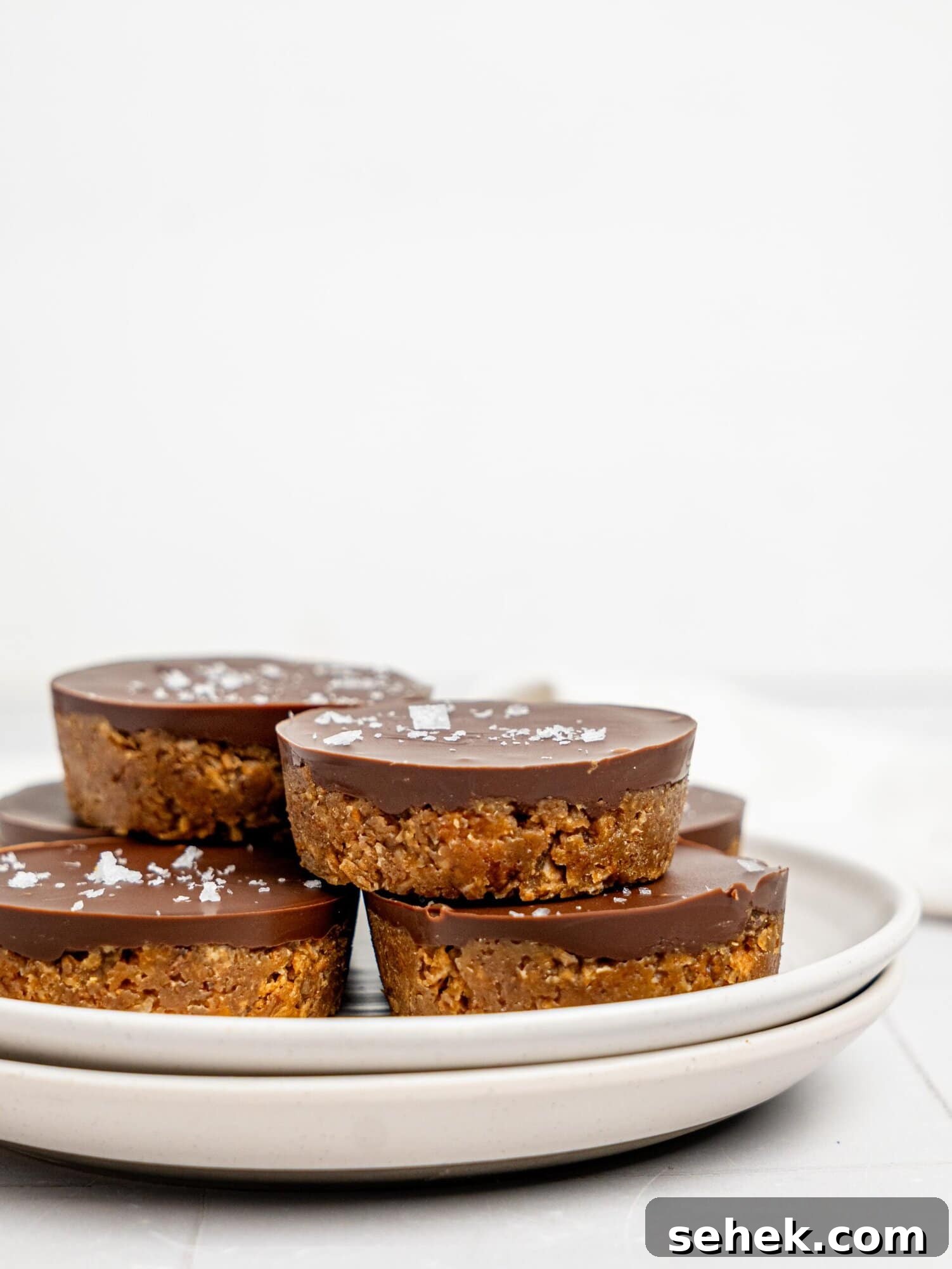 Peanut Butter Weetbix Cups on a white plate.