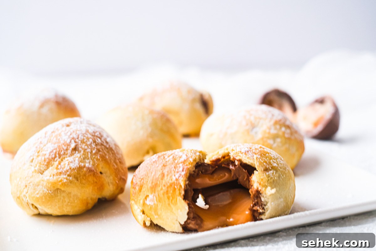 Air-Fried Cadbury Creme Egg Dessert Recipe 6 the completed air fryer fried creme egg recipe served on a white platter