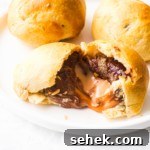 Air-Fried Cadbury Creme Egg Dessert Recipe 10 close up view of one air fryer fried creme egg split in half