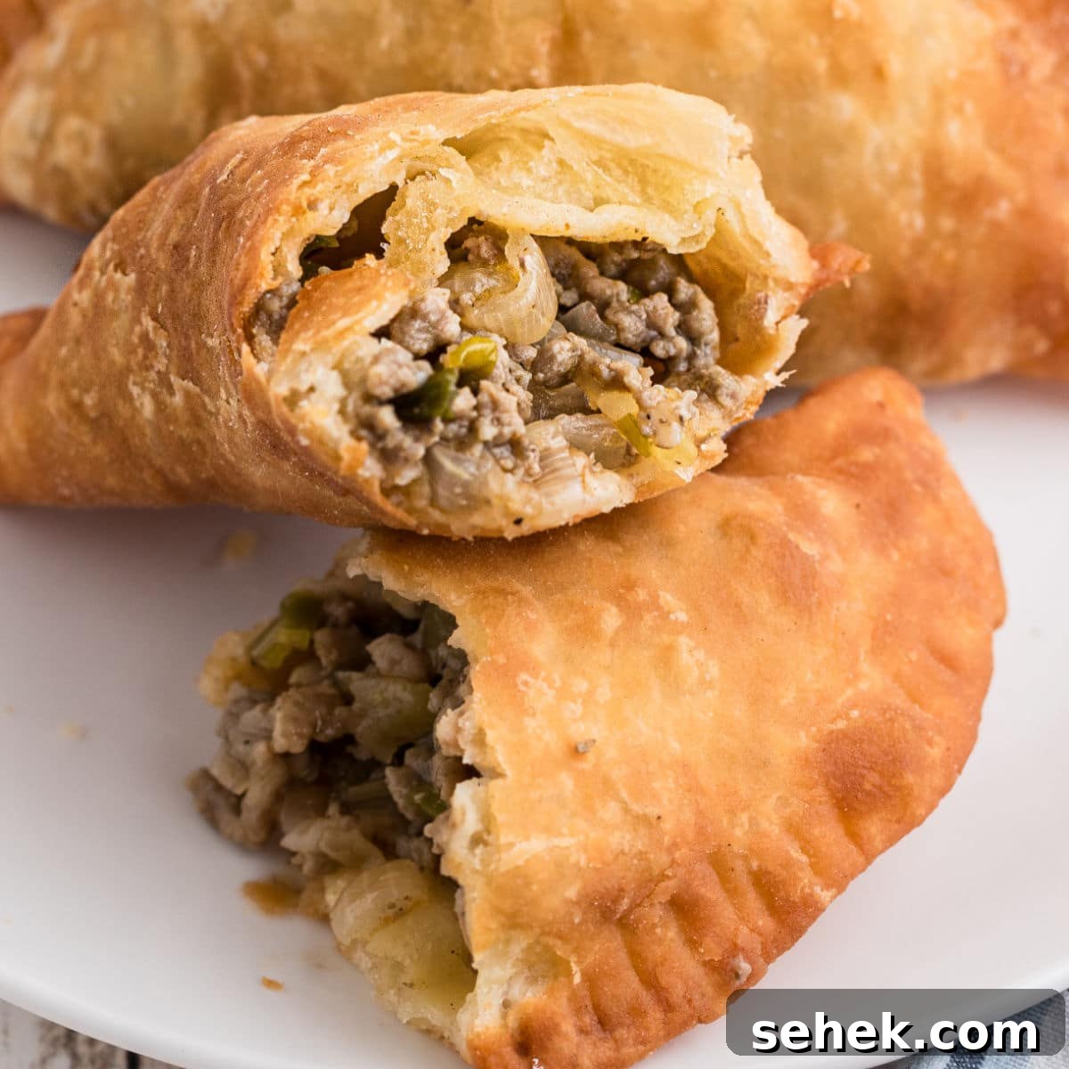 28 Delicious Sides to Serve with Jambalaya 17 A natchitoches meat pie cut in half.