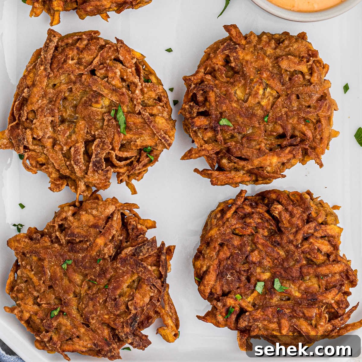 28 Delicious Sides to Serve with Jambalaya 24 Overhead closeup shot of sweet potato fritter recipe.