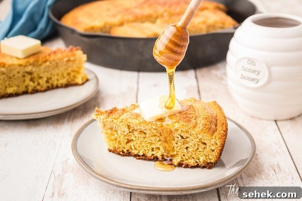 28 Delicious Sides to Serve with Jambalaya 26 slice of cornbread having honey drizzled on top