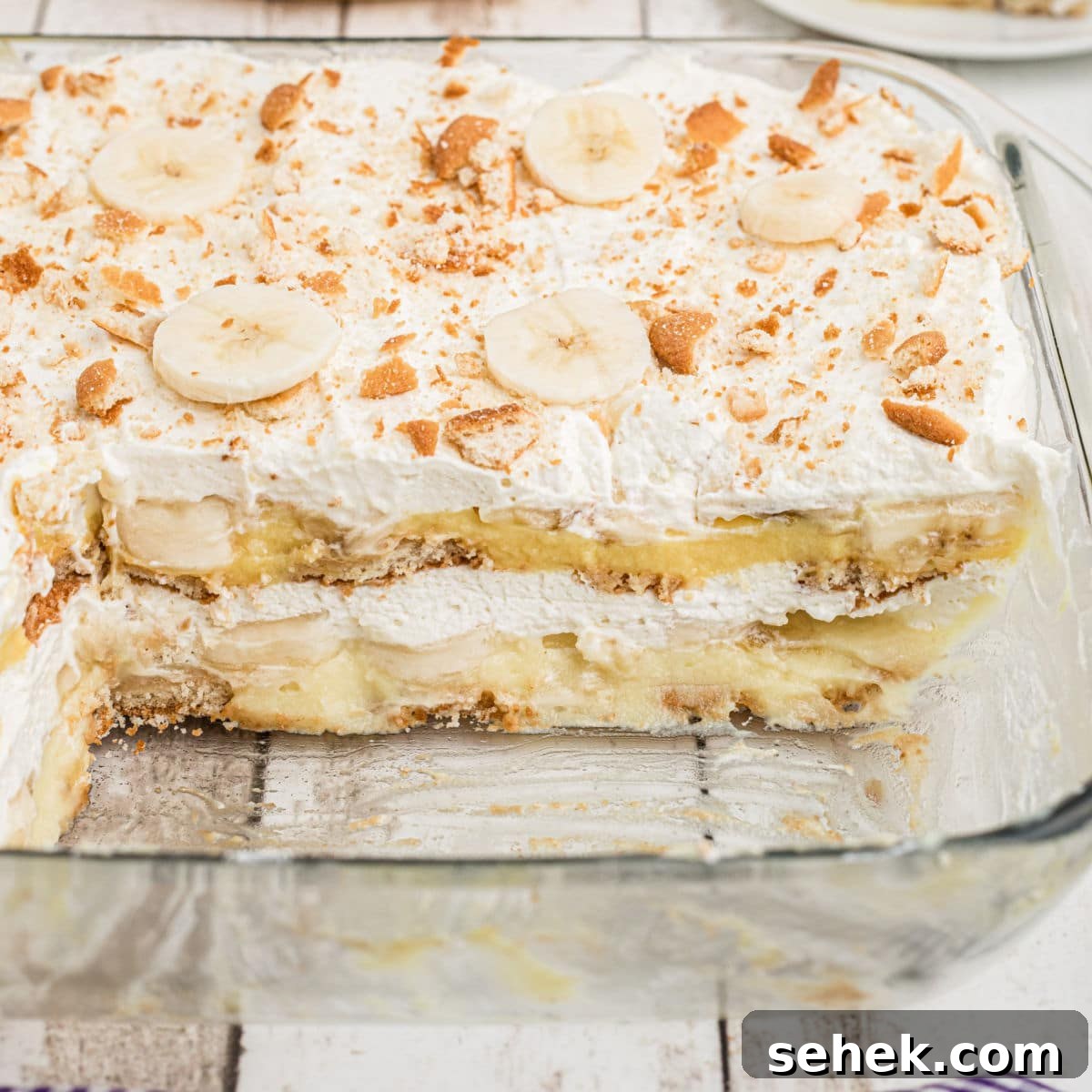 28 Delicious Sides to Serve with Jambalaya 32 A dish full of no bake banana pudding with a few pieces missing.