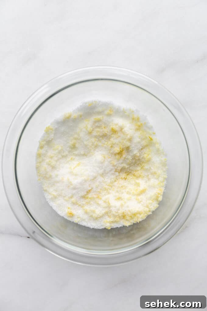 Moist Lemon Poppy Seed Muffins Recipe 4 sugar and lemon zest in a bowl