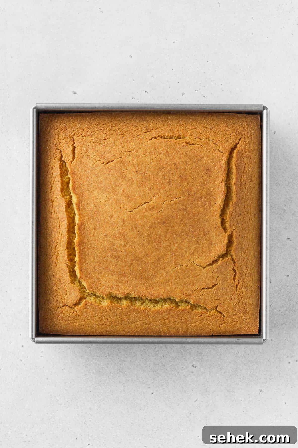 Crispy Cornbread Croutons for Salads and Soups 11 An overhead shot of a pan of baked cornbread.