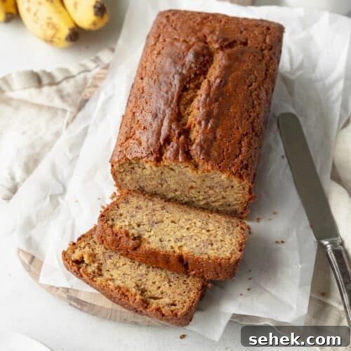 A sliced loaf of gluten free banana bread