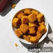 Crispy Cornbread Croutons for Salads and Soups 21 Close-up shot of a small dish of cornbread croutons.