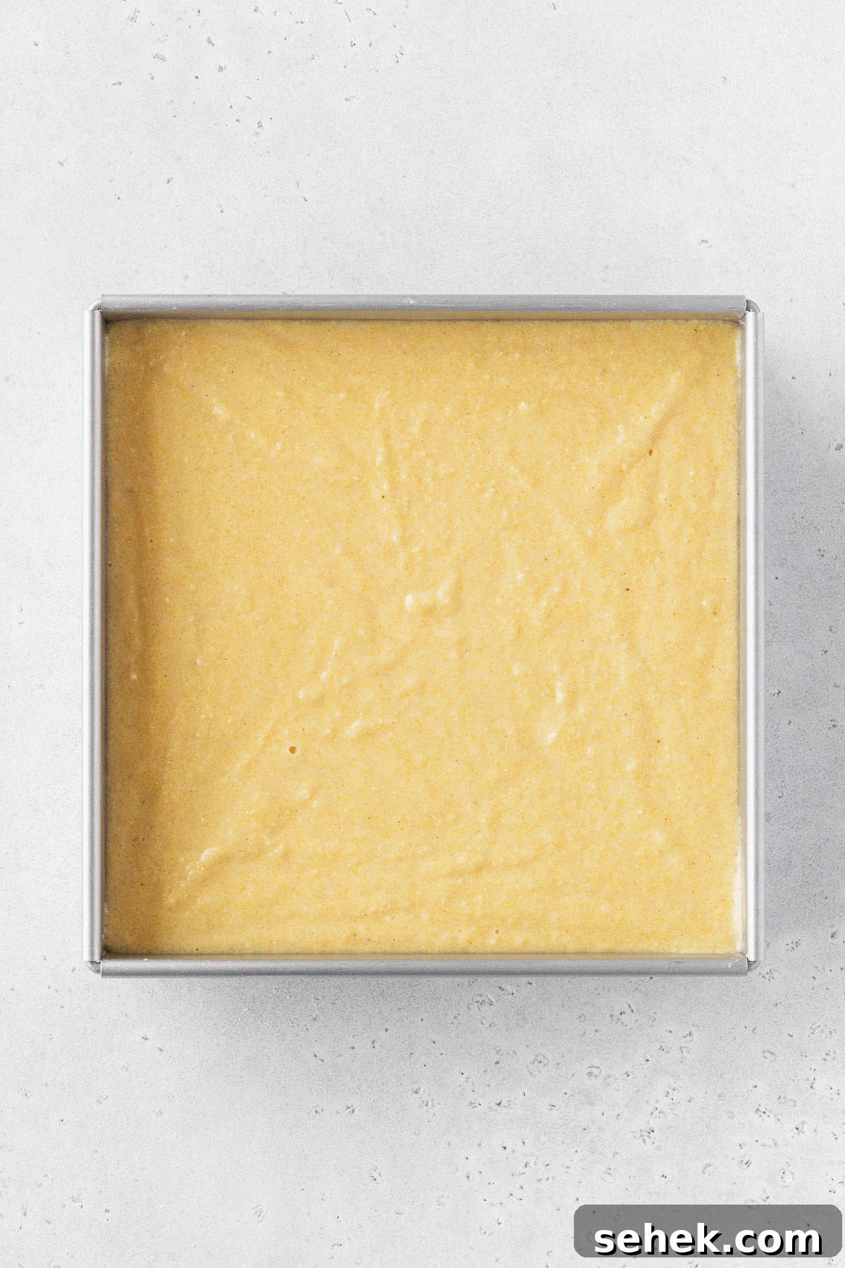 Crispy Cornbread Croutons for Salads and Soups 10 A pan of cornbread before going in the oven.