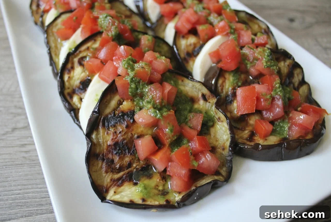 Grilled-eggplant-with-fresh-mozzarella-tomatoes-and-basil-vinaigrette