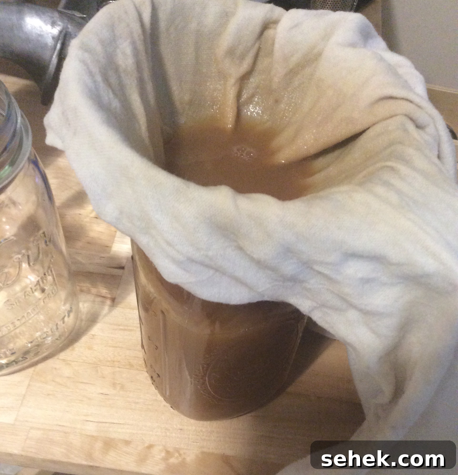 DIY Cider Press: Build One at No Cost with Recycled Parts 6 Filtering the finished cider