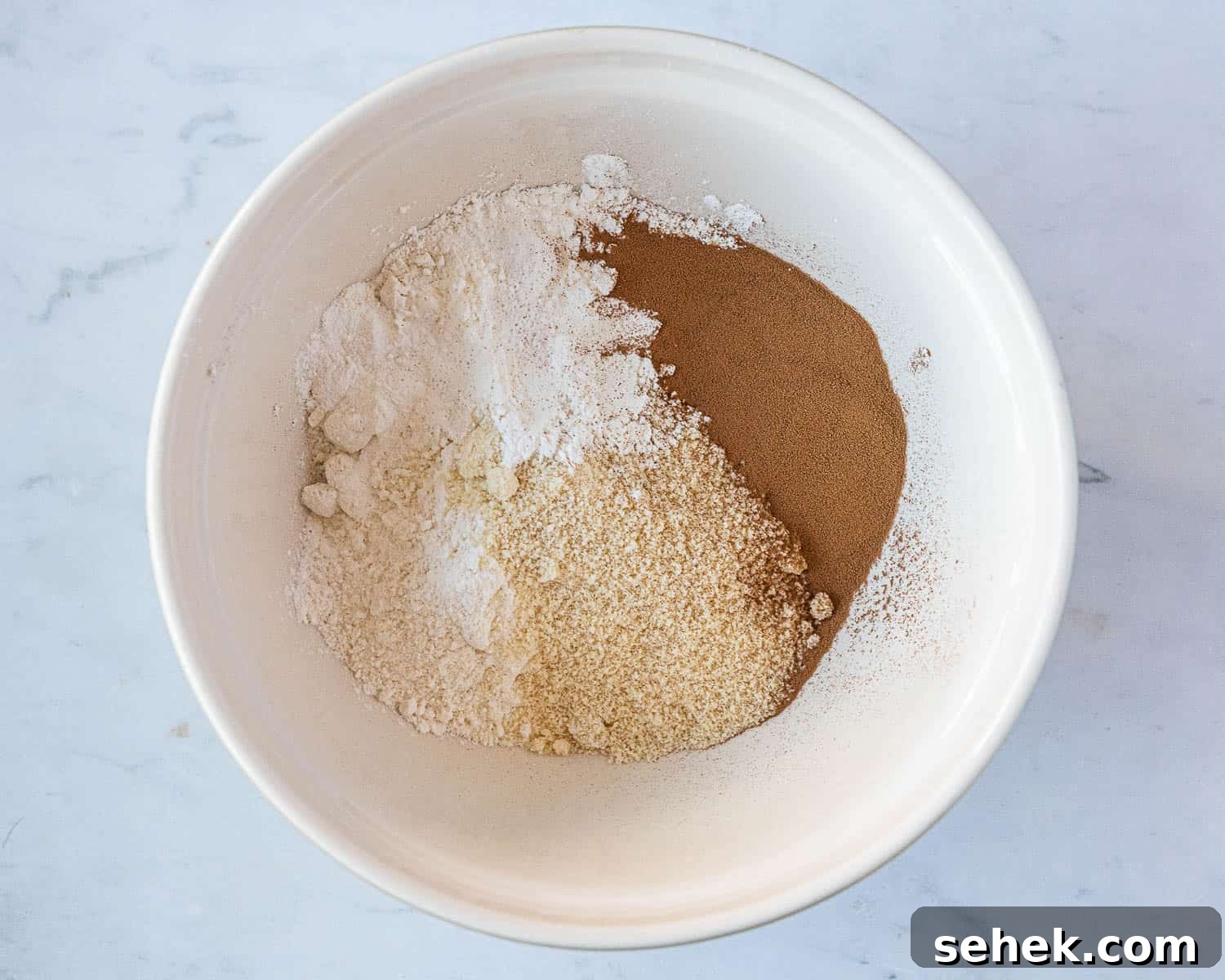 Vegan Gluten-Free Coffee and Walnut Cake Recipe 5 Step 1, the dry ingredients in a bowl.