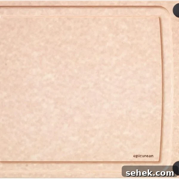 A rectangular, light brown cutting board with a smooth surface.
