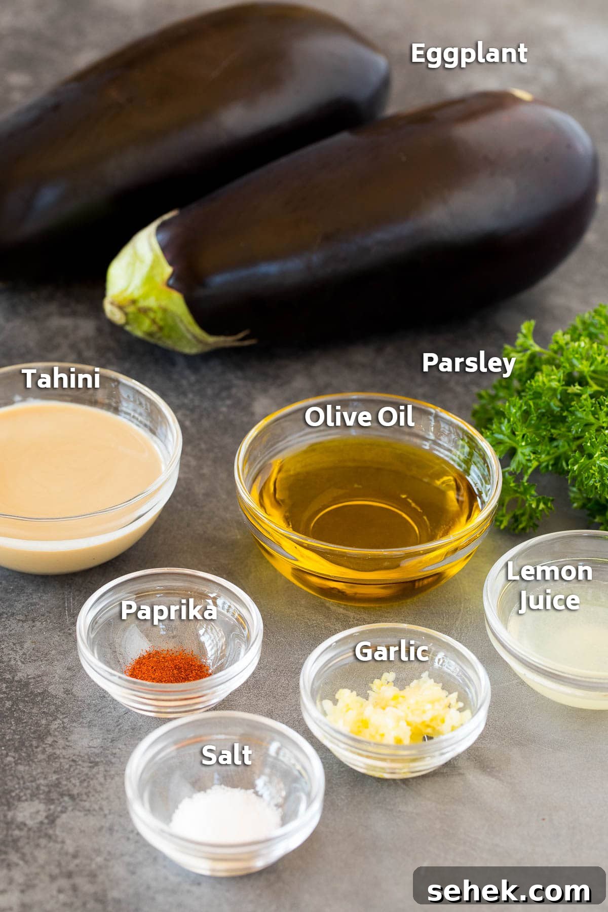 Smoky Baba Ganoush: Creamy Roasted Eggplant Dip 2 Eggplants and bowls of seasonings including spices and herbs