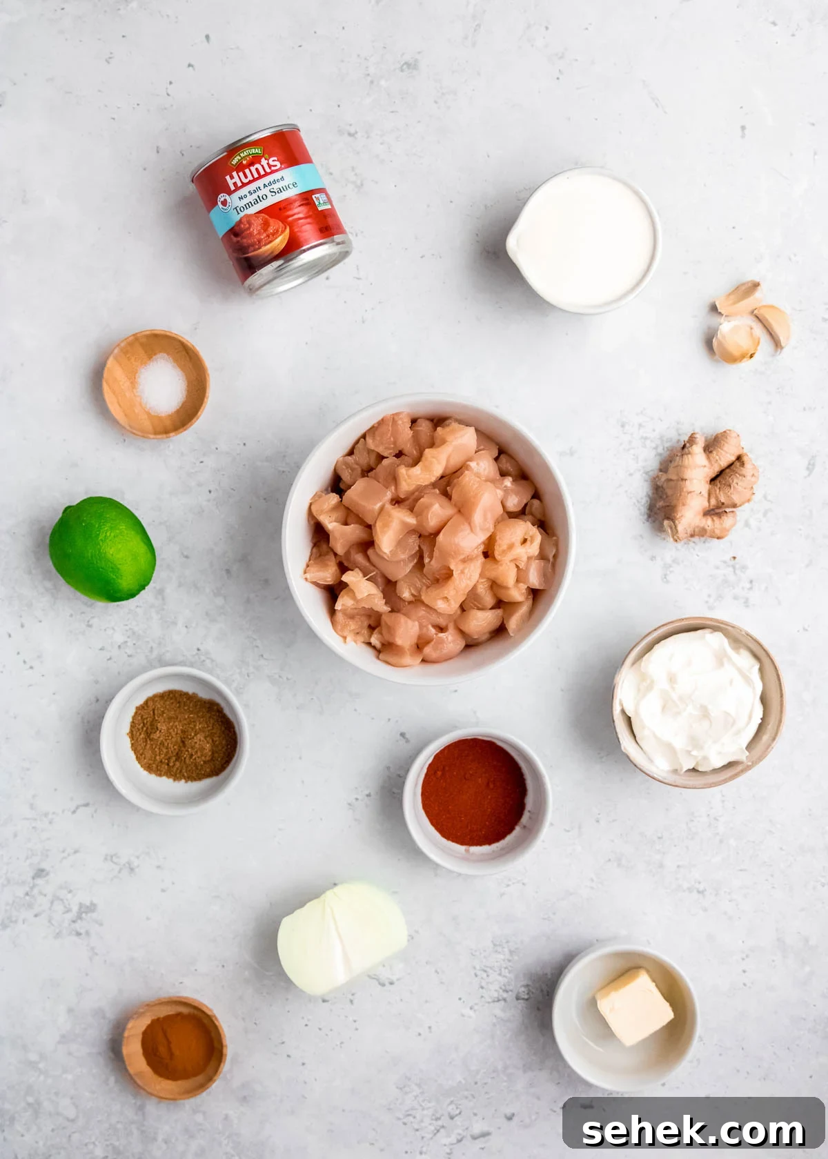 Creamy Indian Butter Chicken Recipe 4 butter chicken ingredients on a white table