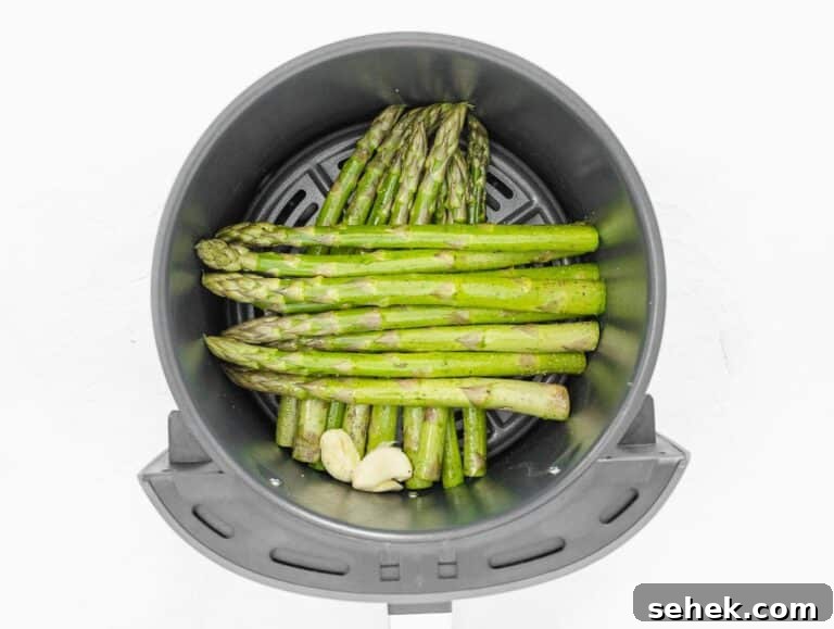 How to Cook Asparagus: Roasting, Sautéing and Steaming Tips 13 asparagus arranged in air fryer