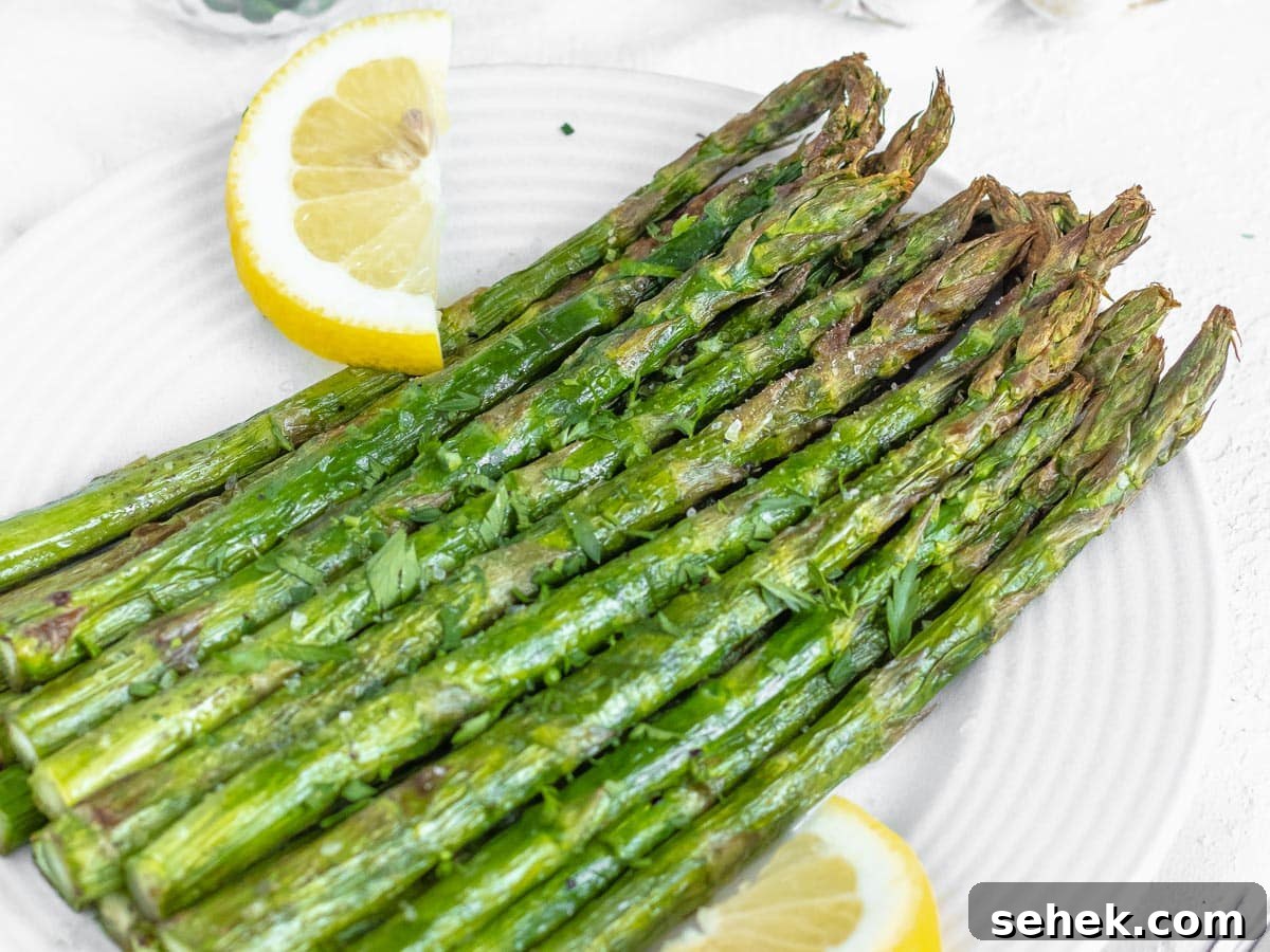 How to Cook Asparagus: Roasting, Sautéing and Steaming Tips 4 roasted asparagus with lemon and fresh parsley