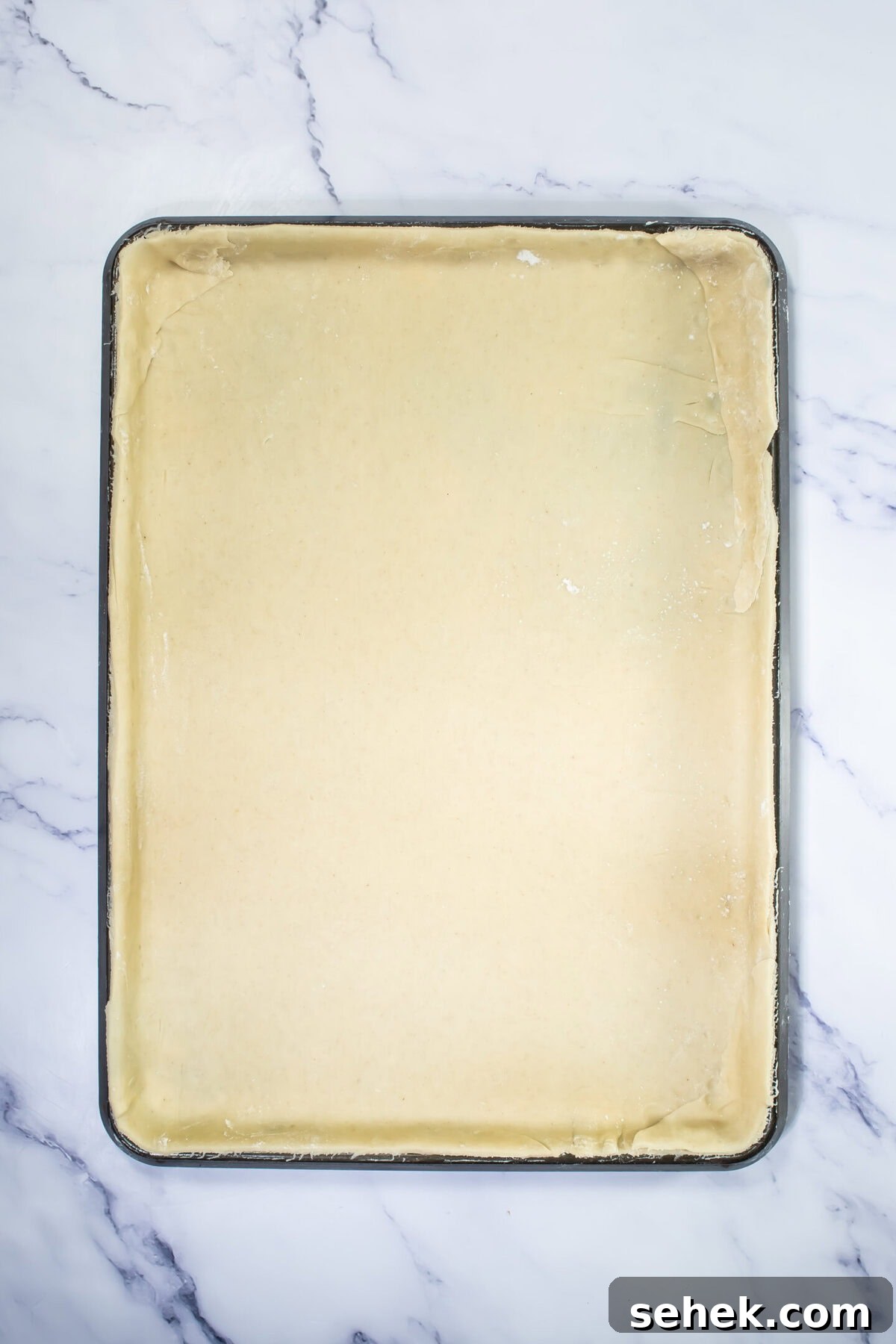 Classic Pecan Slab Pie with Buttery Crust 6 Crust rolled out in baking sheet