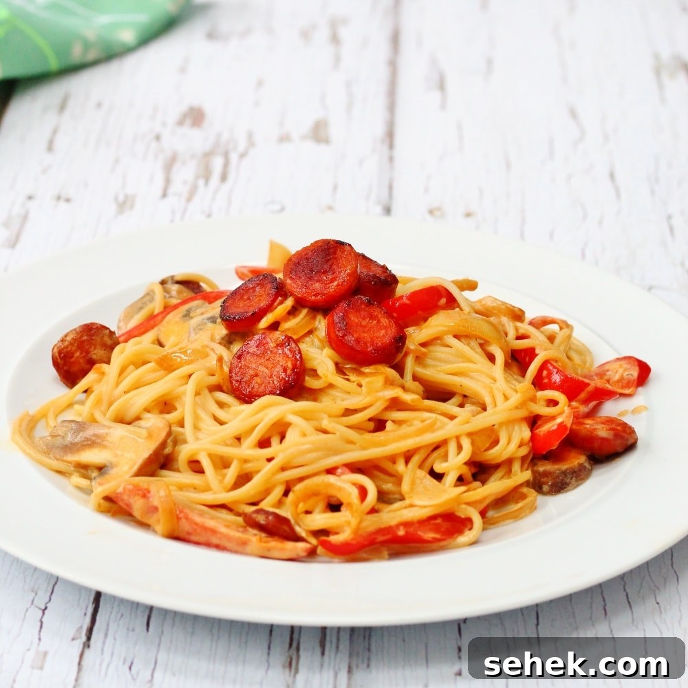 Creamy Chorizo Pasta - Quick Weeknight Dinner 6 white plate with chorizo pasta;